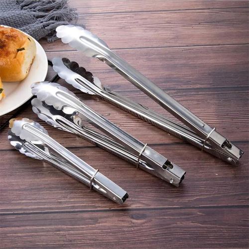 Un Lot Pince De Cuisson Alimentaire